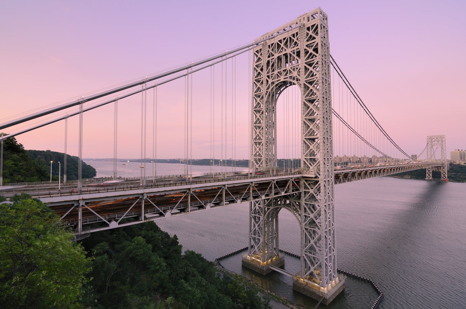 The George Washington Bridge spanning the Hudson River at twilight to connect New Jersey and New York City